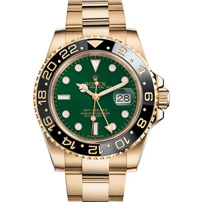 yellow gold gmt green dial
